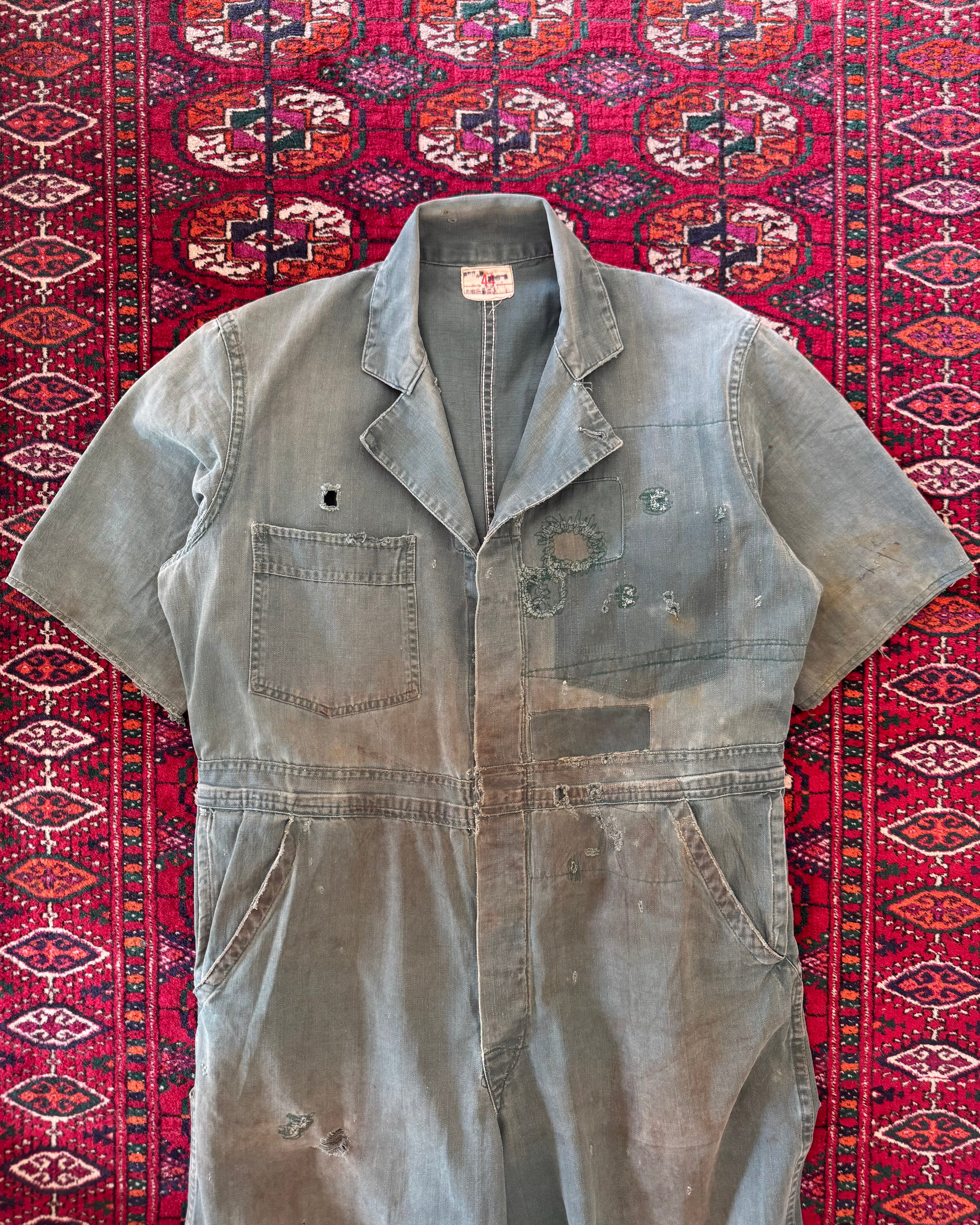 Vintage 1950s union made green herringbone repaired and distressed coveralls, donut button ￼
