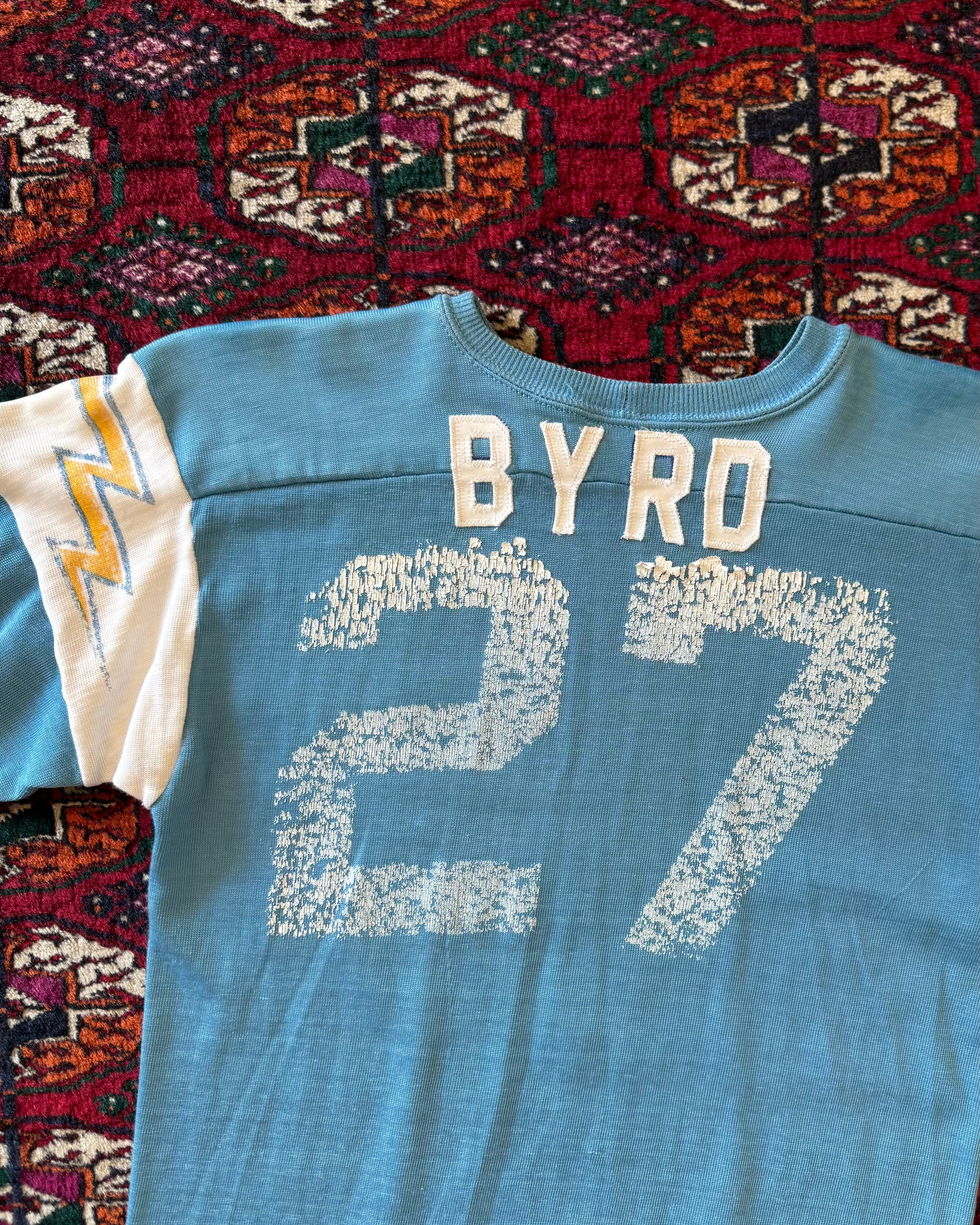 Vintage 1970s/sixties blue faded jersey with lightning bolts ￼