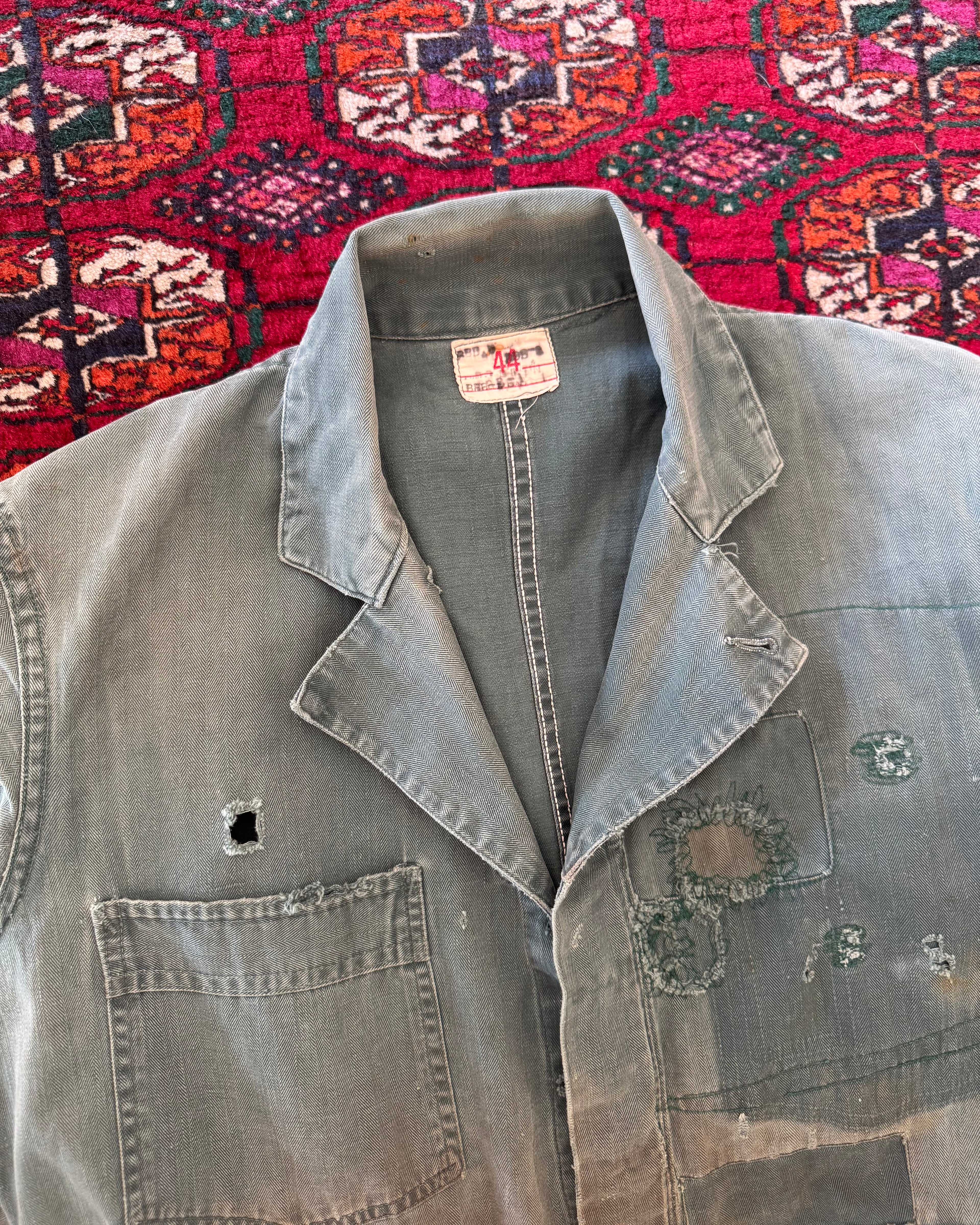 Vintage 1950s union made green herringbone repaired and distressed coveralls, donut button ￼
