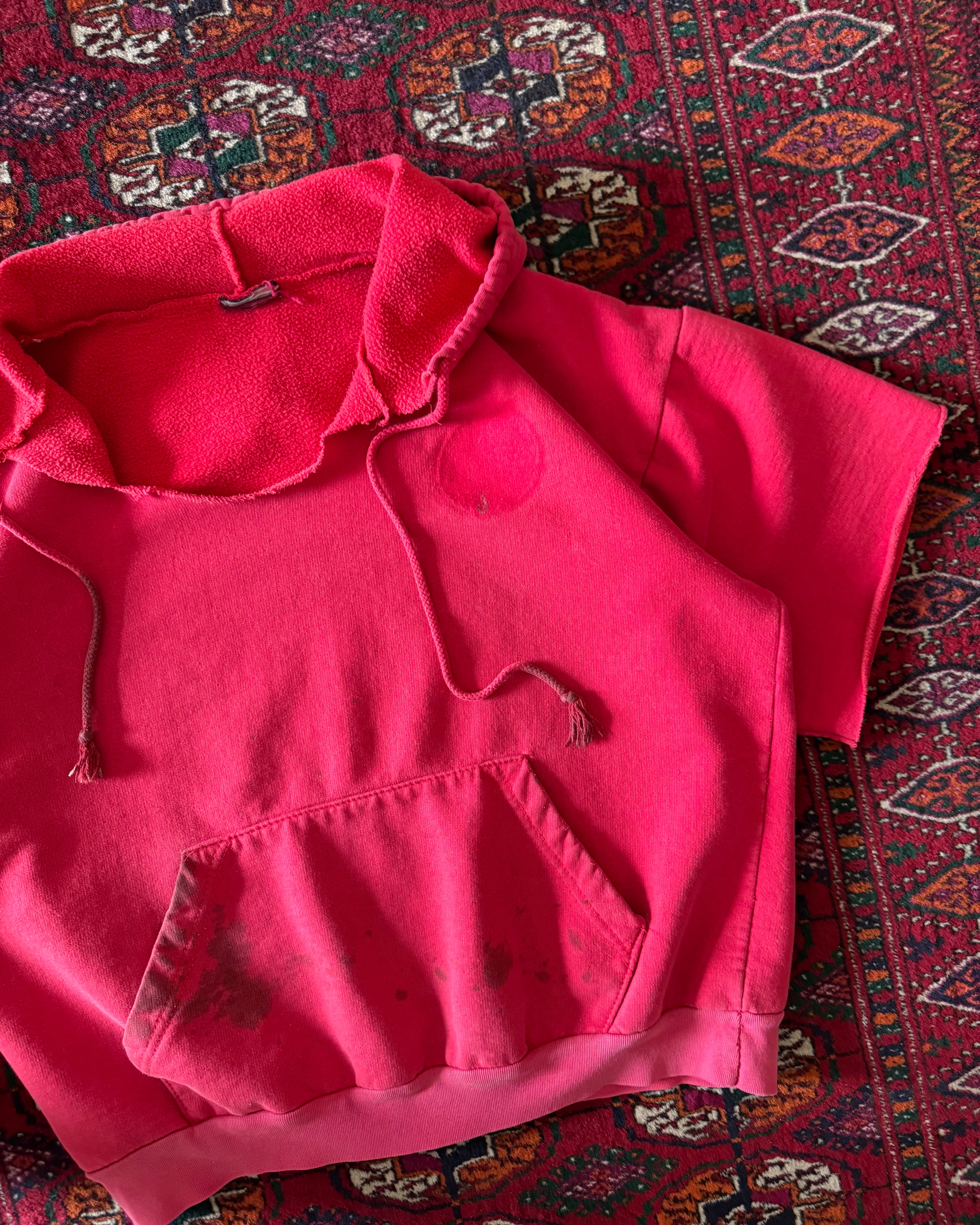 Vintage 1980s faded distressed, red boxy cut off hoodie ￼