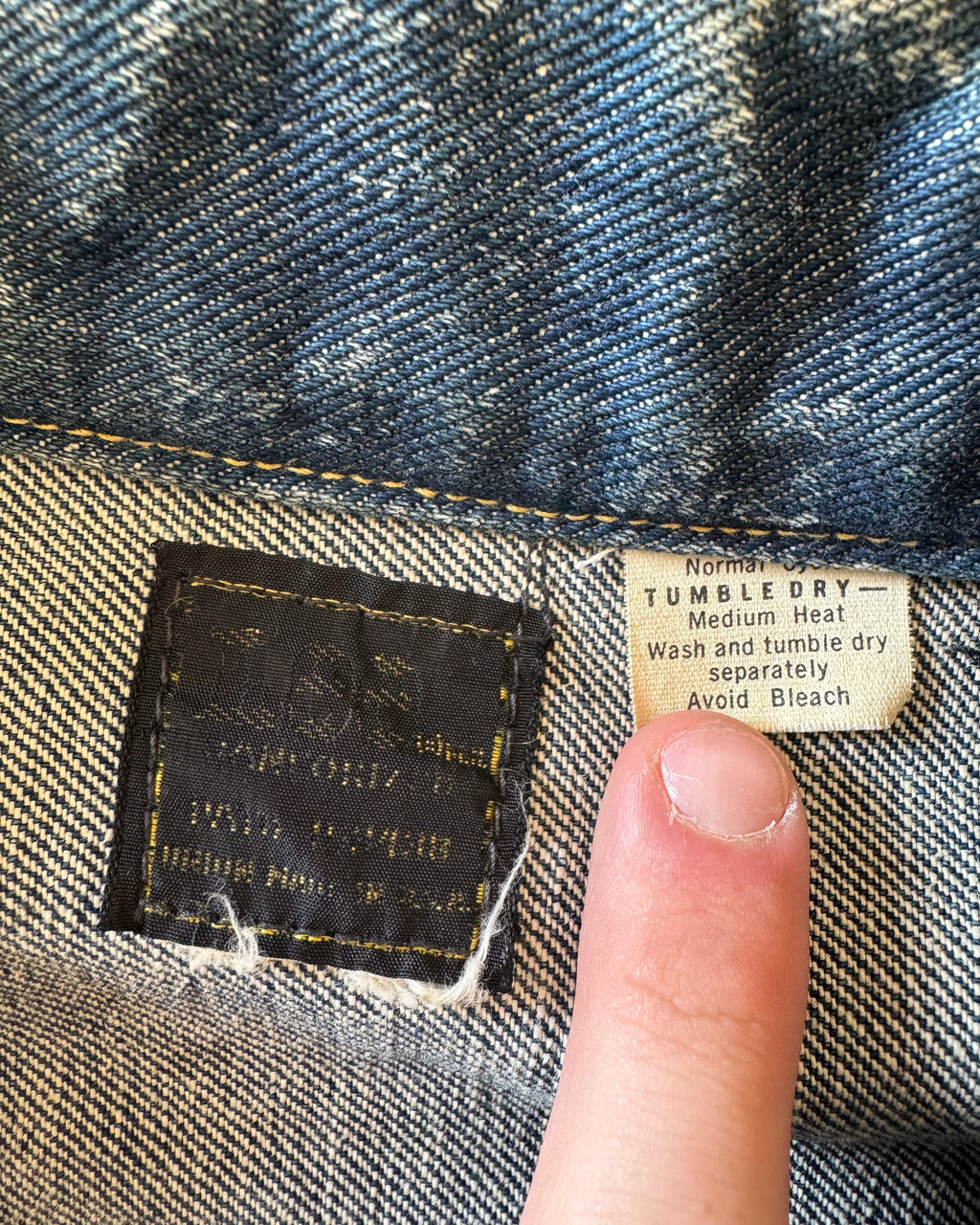 Vintage 1960s Lee serialized dark wash denim jacket with patches