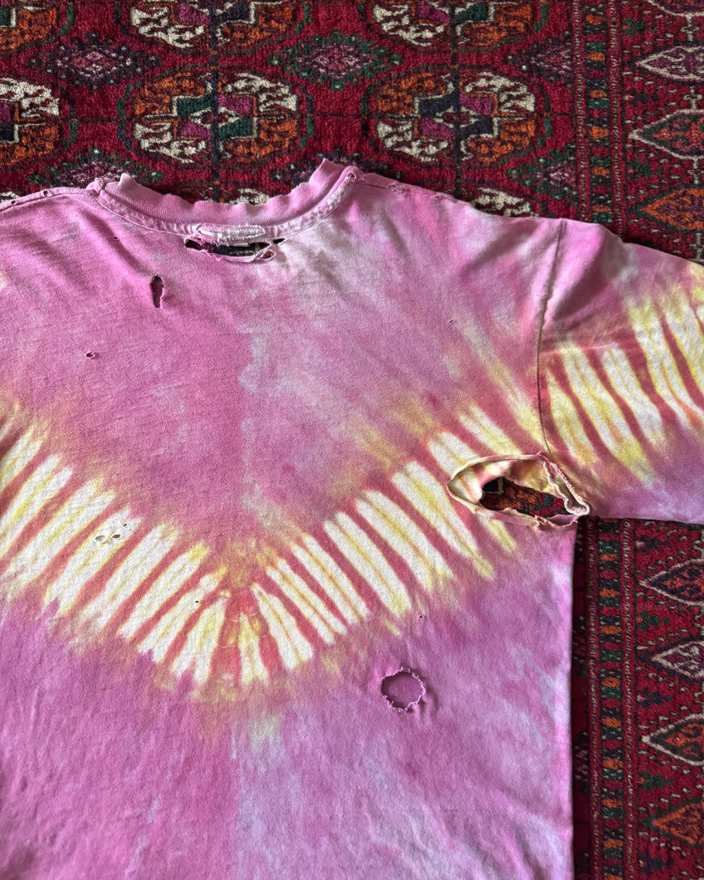 Vintage 1980s heavily faded and distressed tie-dye long sleeve ￼