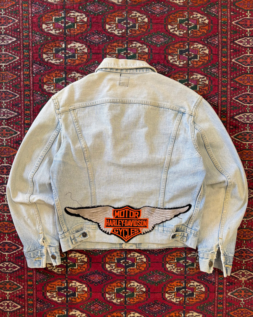 1970s faded Lee denim jacket with Harley Davidson patch