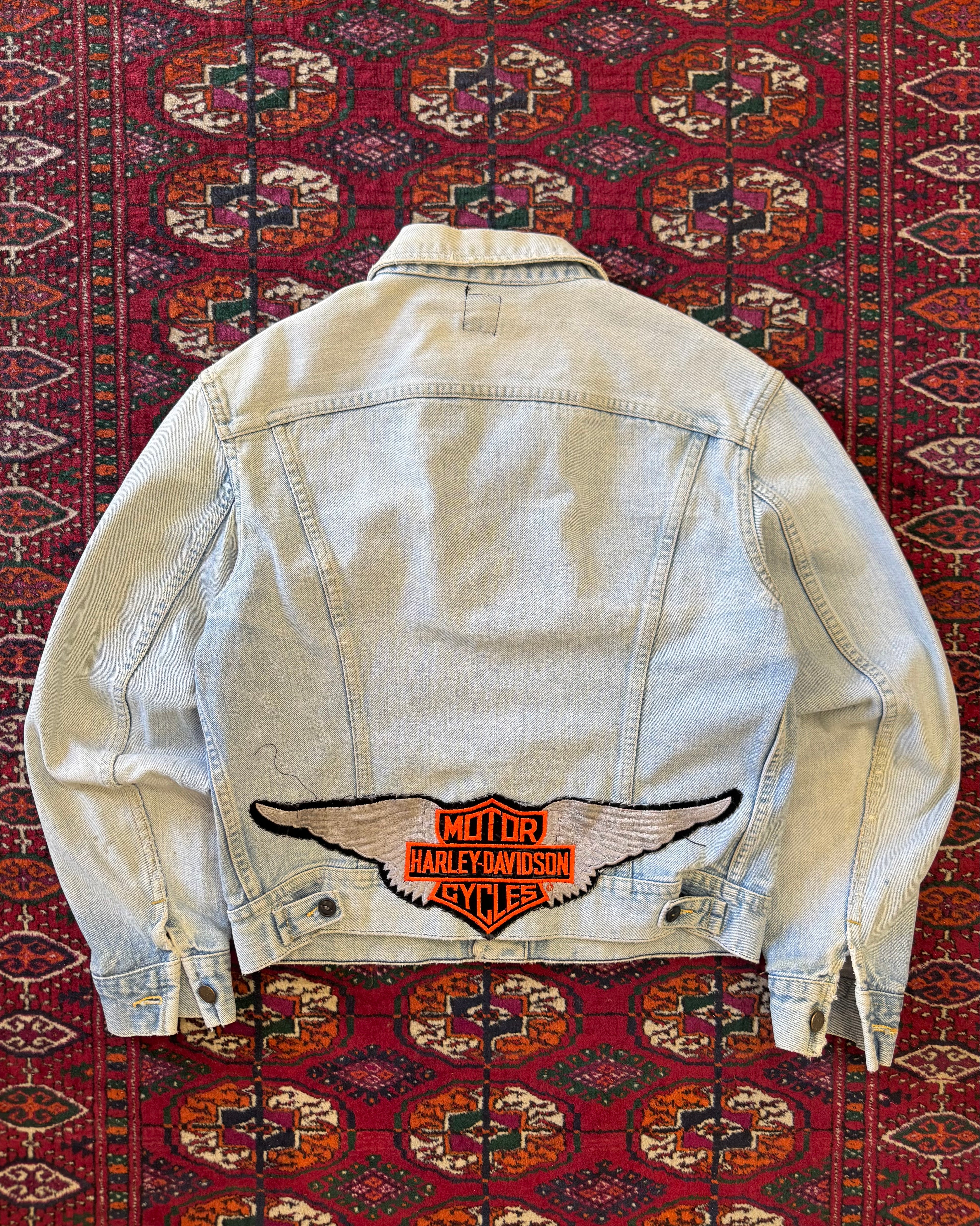 Vintage 1970s faded Lee denim jacket with Harley Davidson patch