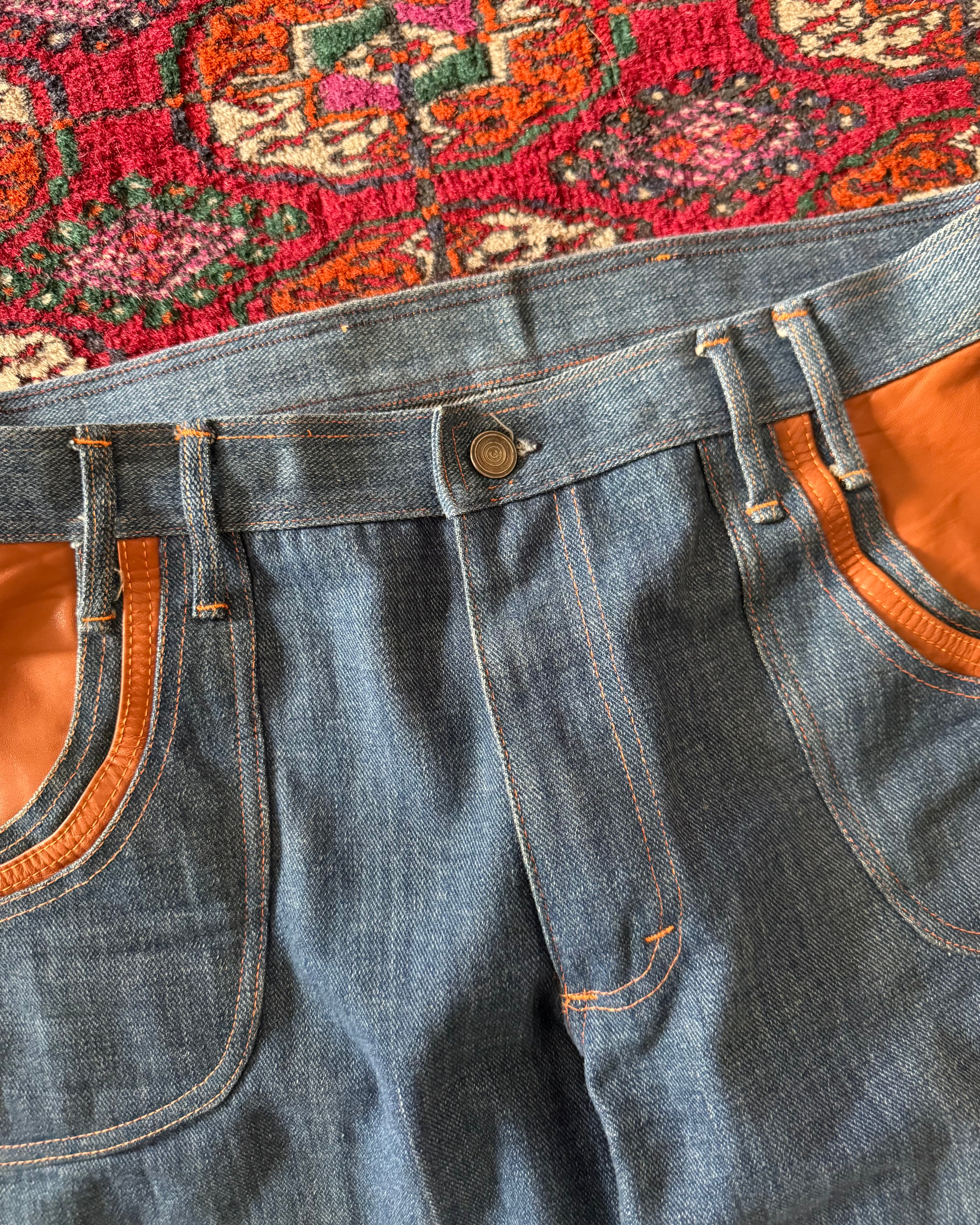 Vintage 1970s/60s denim flares with leather paneling