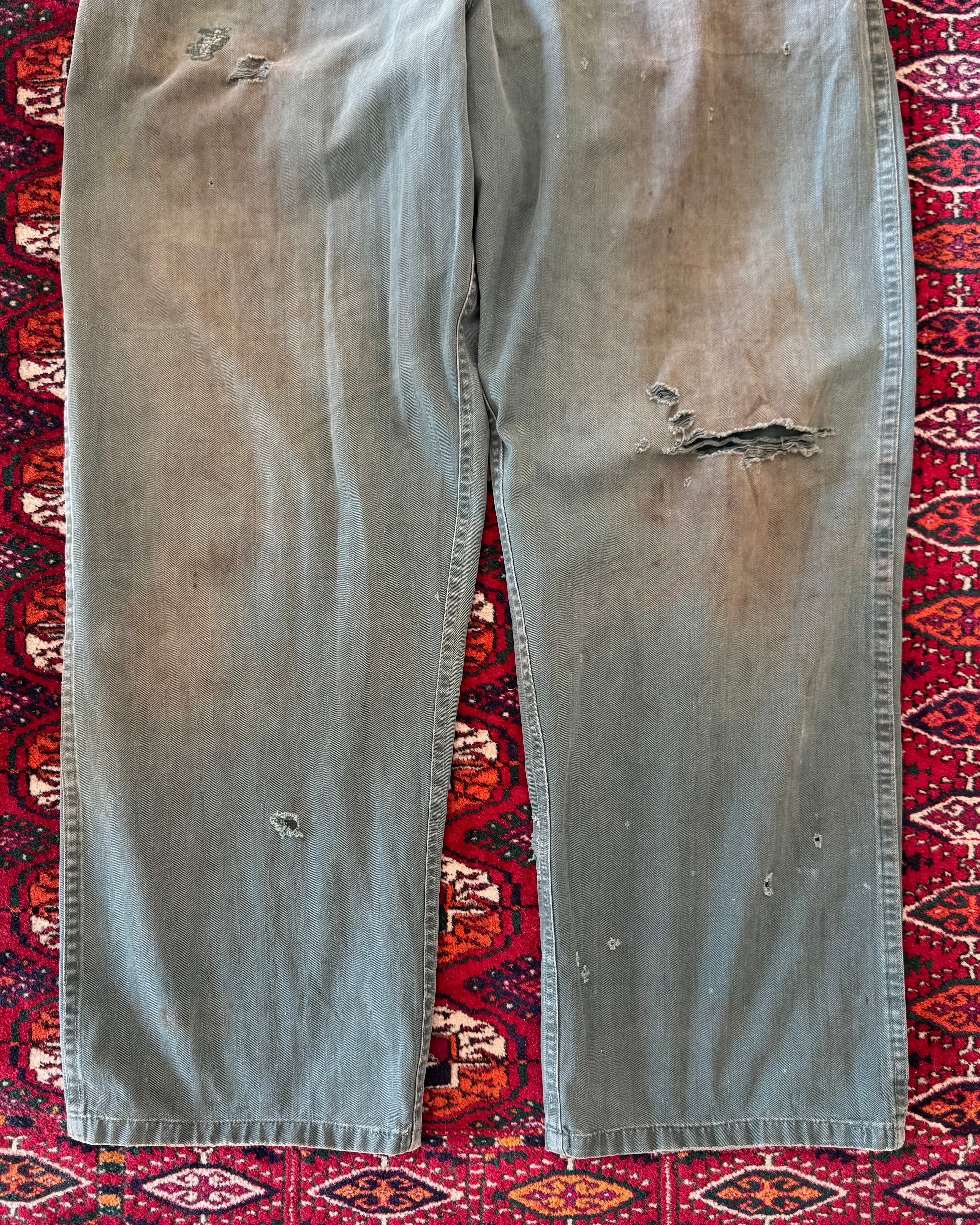 Vintage 1950s union made green herringbone repaired and distressed coveralls, donut button ￼