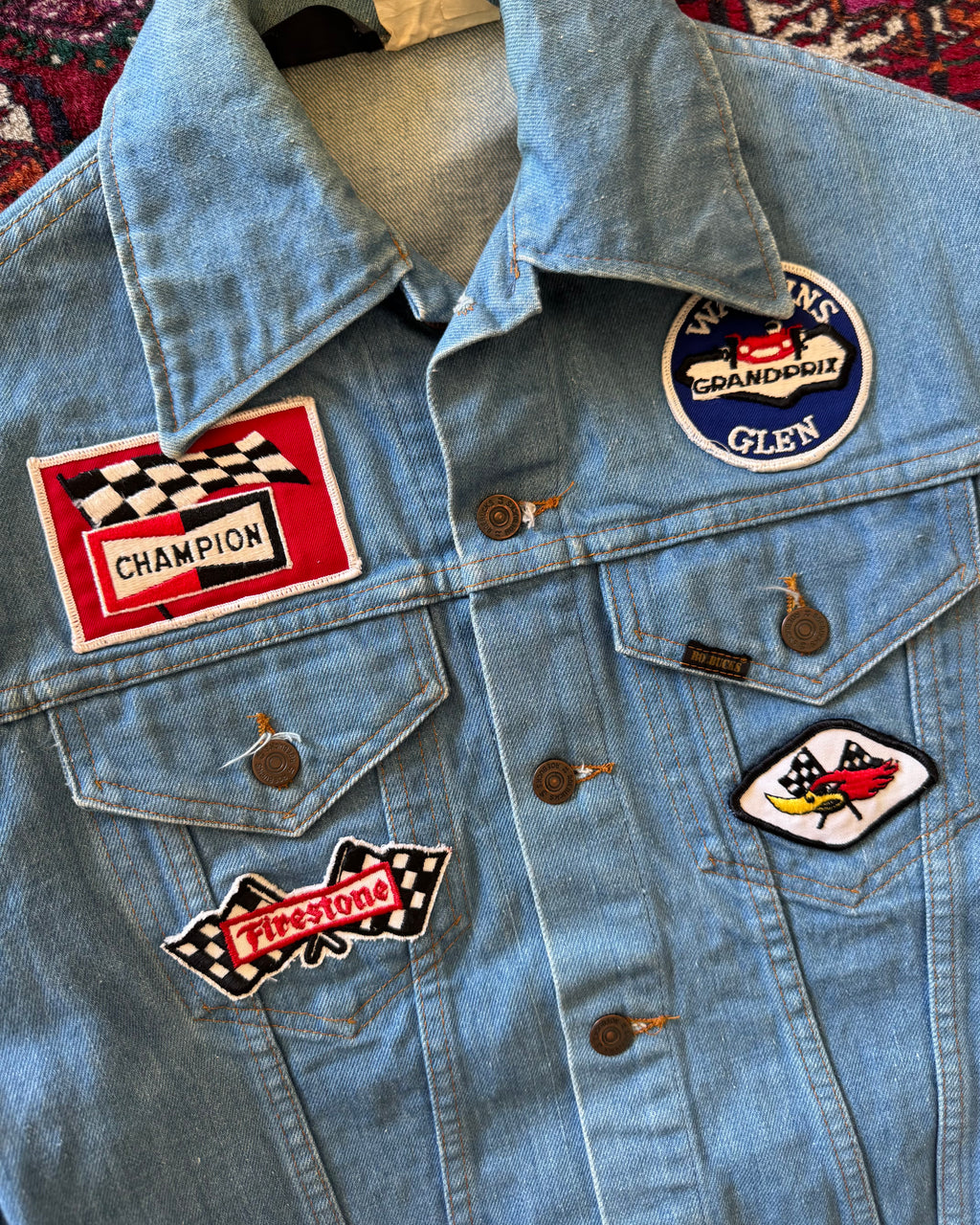 1970s Sears Roebucks denim jacket with racing patch patches