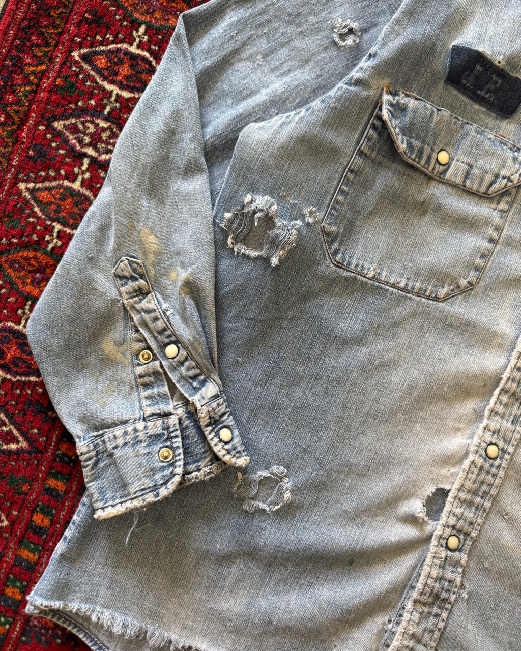 1980s distressed denim pearl snap work shirt