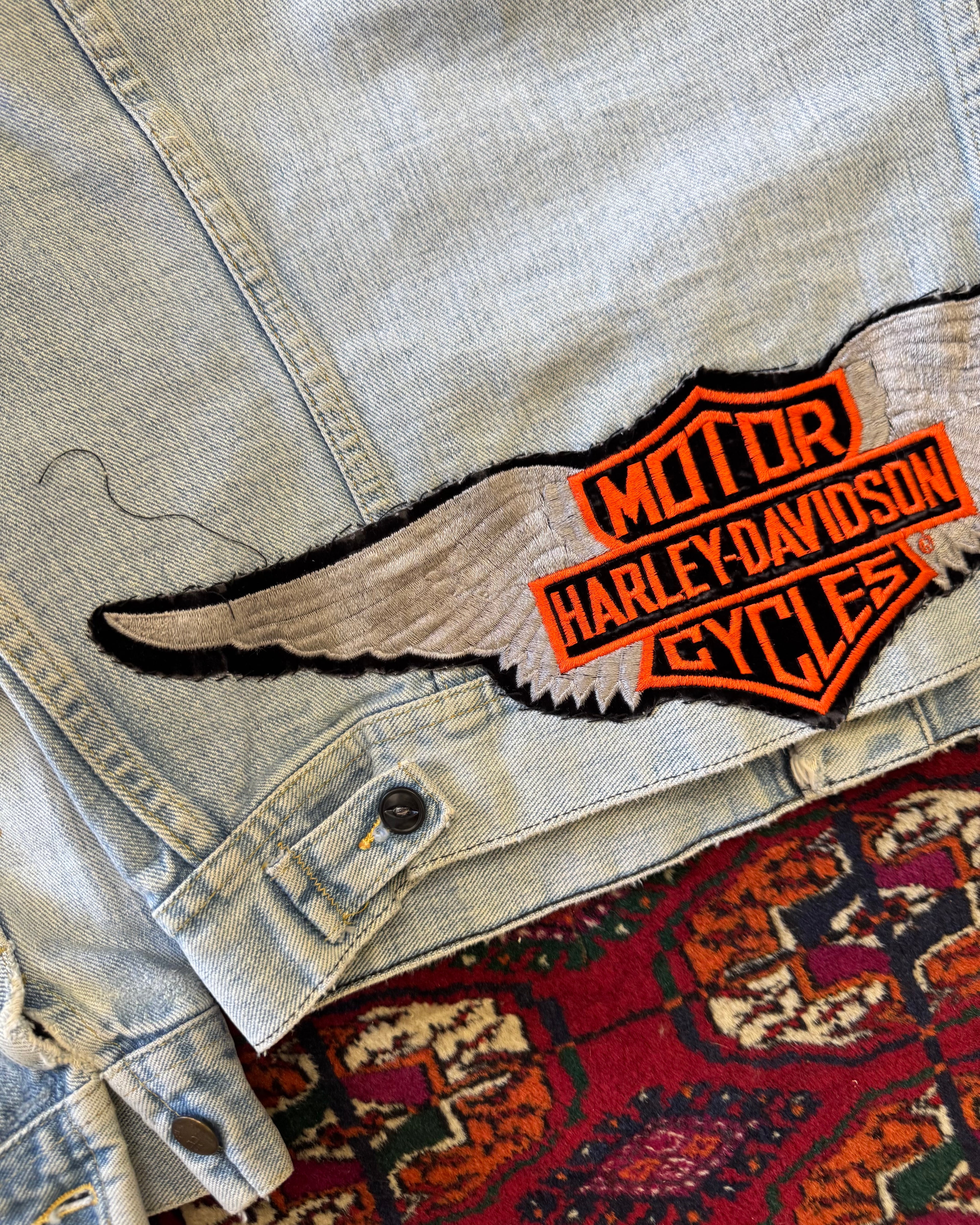 Vintage 1970s faded Lee denim jacket with Harley Davidson patch