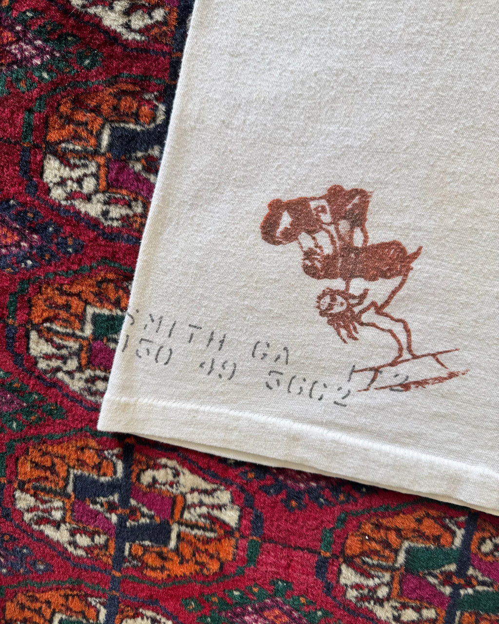 1960s army stencil tee with later added skate graphics