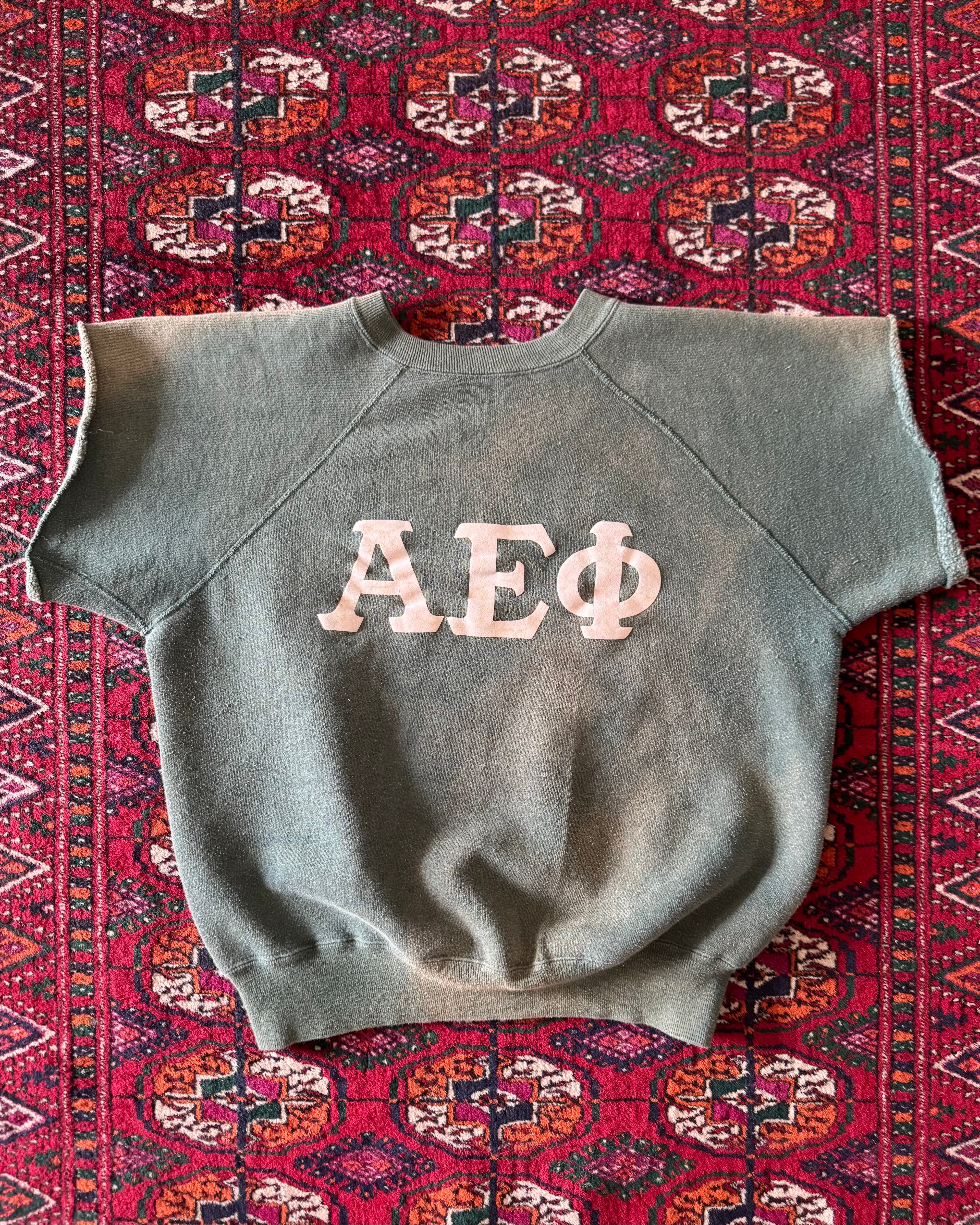 Vintage faded green 1970s/60s cut flock print fraternity sweat ￼