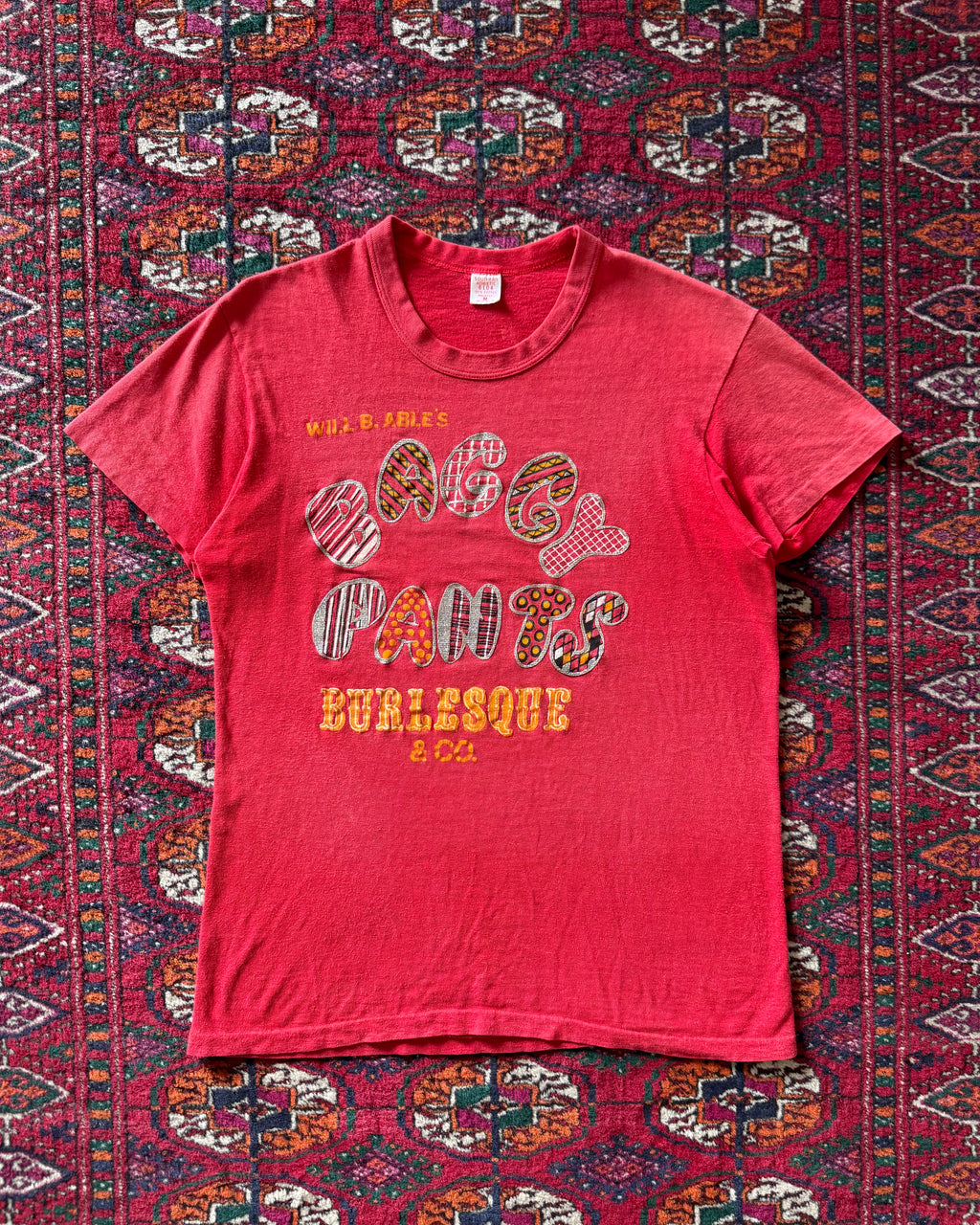 1960s Baggy Pants Burlesque faded red tee