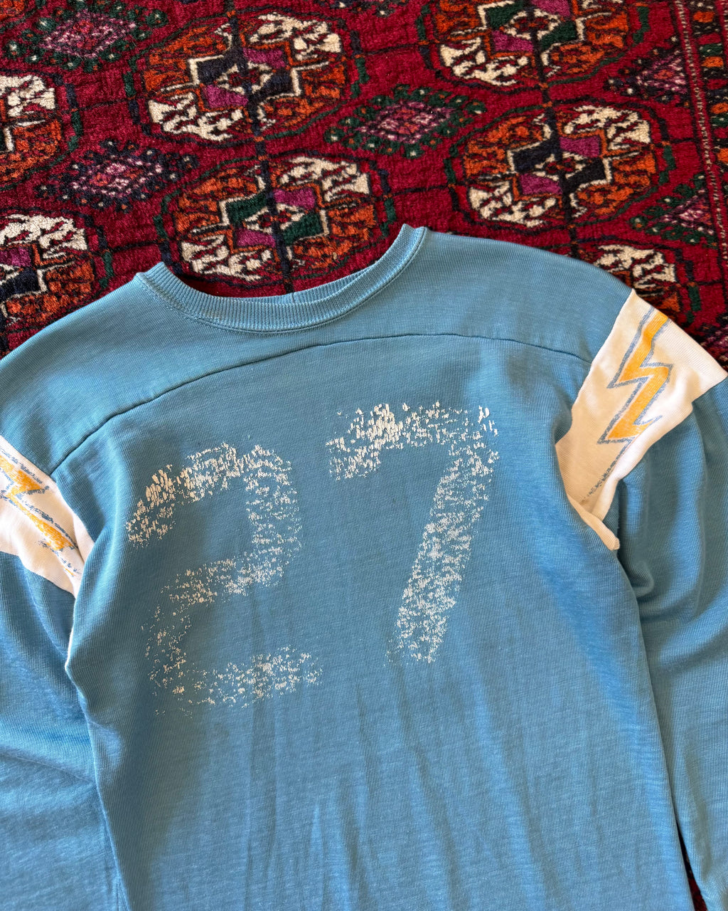 Vintage 1970s/sixties blue faded jersey with lightning bolts ￼